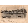 Carte postale ancienne de Saint-Jean-de-Luz montrant la Maison de l'Infante et le port avec des voiliers en 1903.
