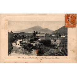 Carte postale ancienne de Saint-Jean-Pied-de-Port représentant l'Établissement des Bains au bord de la Nive.