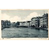 Carte postale ancienne Bayonne montrant les bords de la Nive, les quais et le pont du centre historique.