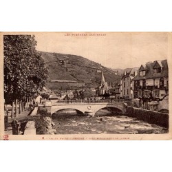 Carte postale ancienne d'Arreau montrant le pont sur la Neste de Louron dans la vallée d'Aure.