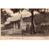 Carte postale ancienne de la basilique de Lourdes éditée par LL avec verso ancien non divisé.