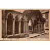 Carte postale ancienne de Bagnères-de-Bigorre montrant les arcatures et le portail de l'ancienne église Saint-Jean.