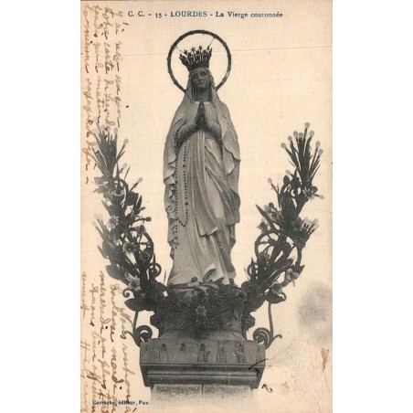 Carte postale ancienne de Lourdes montrant la statue de la Vierge couronnée avec correspondance manuscrite au verso.