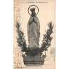 Carte postale ancienne de Lourdes montrant la statue de la Vierge couronnée avec correspondance manuscrite au verso.