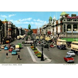 Carte postale moderne représentant O'Connell Street à Dublin avec ses bus à impériale et la statue de Daniel O'Connell.