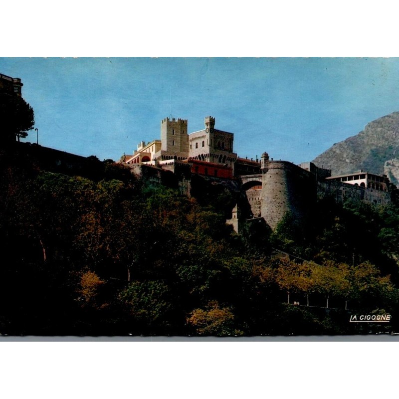 Carte postale moderne du Palais Princier de Monaco sur le Vieux Rocher avec cachet touristique de Monte-Carlo.