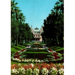 Carte postale moderne des jardins du Casino de Monte-Carlo avec parterres fleuris, palmiers et timbre français de 1967.