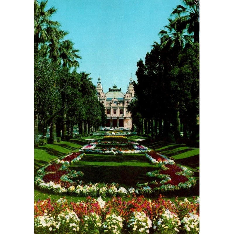Carte postale moderne des jardins du Casino de Monte-Carlo avec parterres fleuris, palmiers et timbre français de 1967.