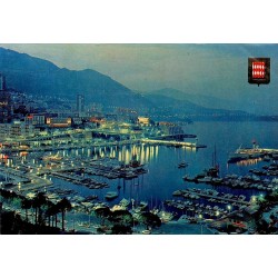 Carte Postale Moderne de Monaco montrant Monte-Carlo et le port Hercule illuminés de nuit, carte voyagée en 1980.