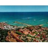 Carte postale ancienne représentant une vue aérienne de la ville de Rhodes, de son port et du Palais des Grands Maîtres.