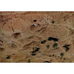Matmata habitations troglodytes dans le paysage désertique du Sud tunisien carte postale CPM