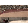 CPA corrida montrant un matador exécutant une passe de muleta devant un taureau dans l’arène