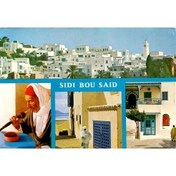 CPM Sidi Bou Saïd avec village blanc, ruelles traditionnelles et musicien tunisien