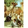 CPM Sud tunisien montrant des chameliers assis parmi leurs dromadaires harnachés dans une oasis