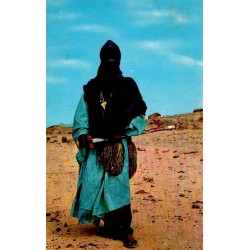 CPSM Hoggar montrant un homme bleu touareg en tenue traditionnelle dans le Sahara algérien