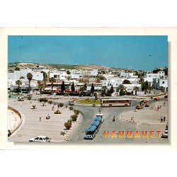 CPM Hammamet montrant le centre-ville, un petit train touristique, des autocars et des taxis