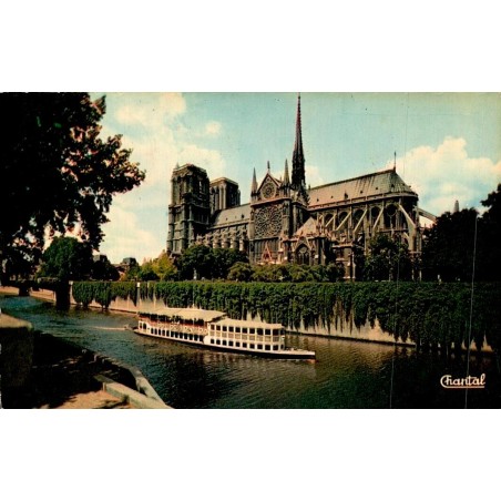 CPSM Paris Notre-Dame de Paris avec bateau-mouche sur la Seine en 1958