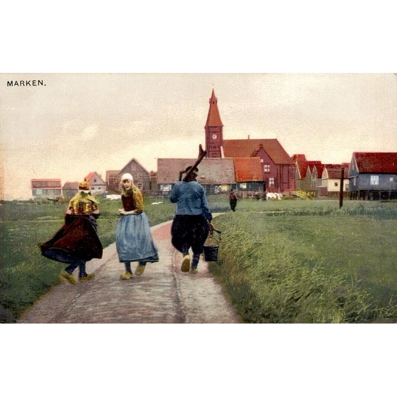CPA en photochromie représentant des habitants en costume traditionnel dans le village de Marken aux Pays-Bas.