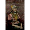 CPA représentant une jeune fille en costume traditionnel de l'île de Marken aux Pays-Bas au début du XXᵉ siècle.