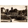 CPSM Montluçon Jardin Carnot et église Notre-Dame dans l’Allier