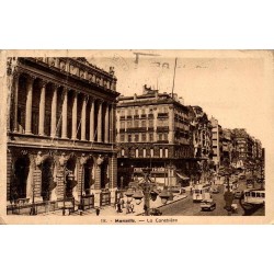CPSM Marseille Canebière et Palais de la Bourse avec tramways, circulée en 1939
