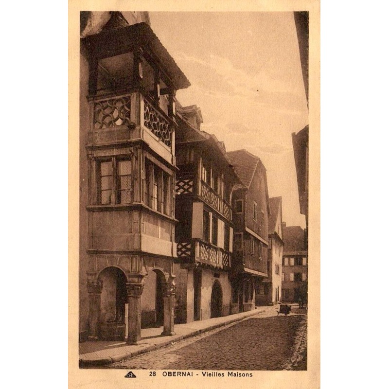 CPA Obernai vieilles maisons alsaciennes à colombages dans une rue pavée du Bas-Rhin