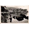 CPSM Bastia Corse Vieux-Port avec personnages, ville ancienne et montagnes