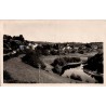 CPSM Corrèze vue générale du bourg et route du Pont Neuf en 1951