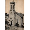 CPA Tulle église Saint-Jean et personnages devant le clocher en Corrèze