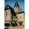 CPSM Ussel Corrèze vieille maison à tour et commerces du centre historique