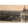 Carte postale ancienne de Paris montrant une vue panoramique prise depuis le sommet des tours de Notre-Dame.