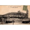 Carte postale ancienne de Paris montrant la Gare de Lyon en vue d’ensemble avec une ambiance ferroviaire d’époque.