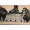 Carte postale ancienne de Paris représentant le Lion de Belfort sculpté par Bartholdi dans une vue monumentale d’époque.