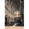 Carte postale ancienne de Paris montrant la nef de l’église Saint-Séverin avec une perspective intérieure gothique d’époque.
