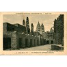 Carte postale ancienne Exposition Coloniale Paris 1931 montrant le Palais de la O.F. et les portiques des commerçants