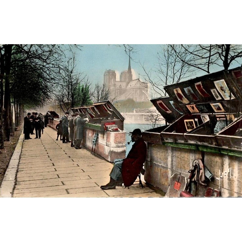 Carte postale ancienne de Paris montrant les bouquinistes du quai de la Tournelle le long de la Seine