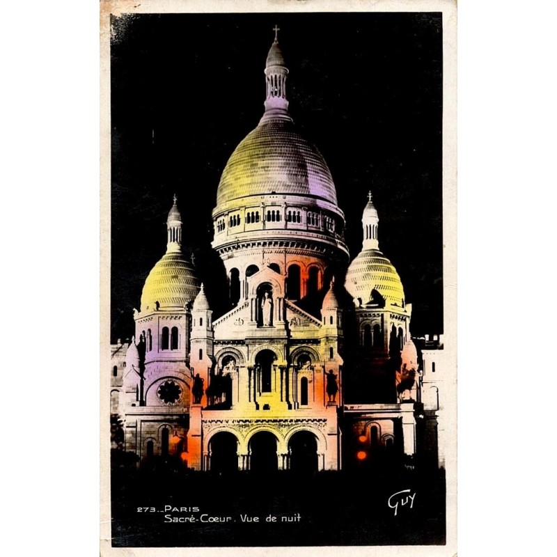 Carte postale ancienne de Paris montrant la basilique du Sacré-Cœur illuminée de nuit à Montmartre