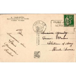 Carte postale ancienne Paris 1937 – Tour Eiffel illuminée et feux d’artifice