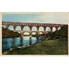 Carte postale ancienne du Pont du Gard représentant l’aqueduc romain dans les environs d’Alès dans le Gard