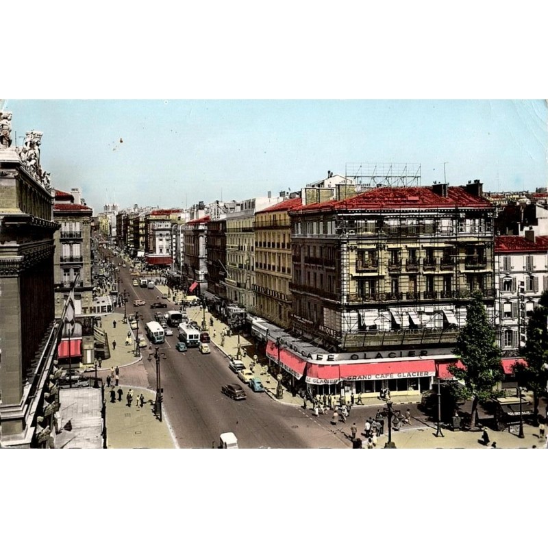 Carte postale ancienne de la Canebière à Marseille montrant l’artère urbaine historique animée