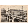 Carte postale ancienne circulée en 1938 représentant le Pont Neuf de Liège et les quais de la Meuse.