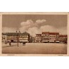 Carte postale ancienne de Saarlouis montrant la Marktplatz avec ses commerces et la place du marché en Allemagne.
