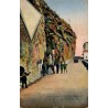 Carte postale ancienne de Grimaldi-Ventimiglia montrant Fonti San Luigi à la frontière italienne avec personnages et automobile.