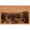 Carte postale ancienne de Mayence montrant la Kaiserstraße avec son boulevard arboré et ses immeubles historiques.