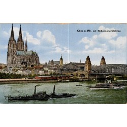 Carte postale ancienne représentant la cathédrale de Cologne et le pont Hohenzollern sur le Rhin en Allemagne.