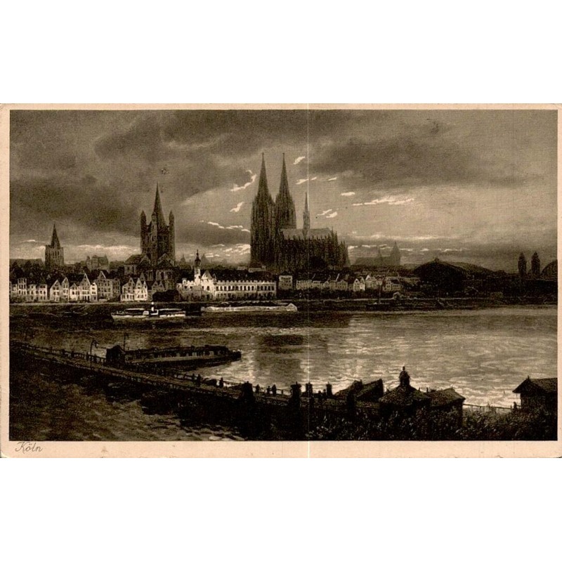 Carte postale ancienne montrant le panorama de Cologne sur le Rhin avec la cathédrale gothique et les quais.