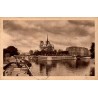 Carte postale ancienne de Notre-Dame de Paris vue depuis la Seine avec le Pont de l'Archevêché.