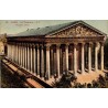 Carte postale ancienne de l'église de la Madeleine à Paris vue en perspective avec sa colonnade monumentale