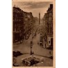 Carte postale ancienne de la rue de la Paix à Paris avec vue sur la colonne Vendôme et la circulation