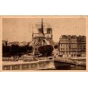 Carte postale ancienne de Notre-Dame de Paris vue de l'abside et du square de l'Archevêché en 1927